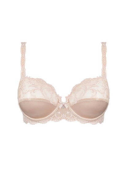Beige bra with lace details on a white background